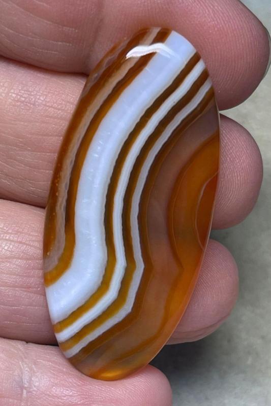Oval 47x22mm Banded Onyx Cabochon 26