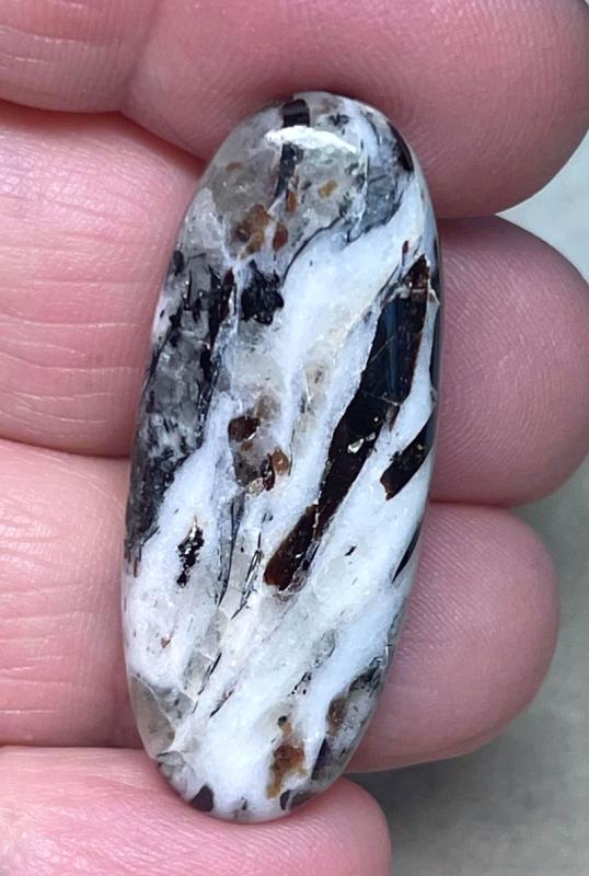 Oval 38x15mm Astrophyllite Cabochon 27