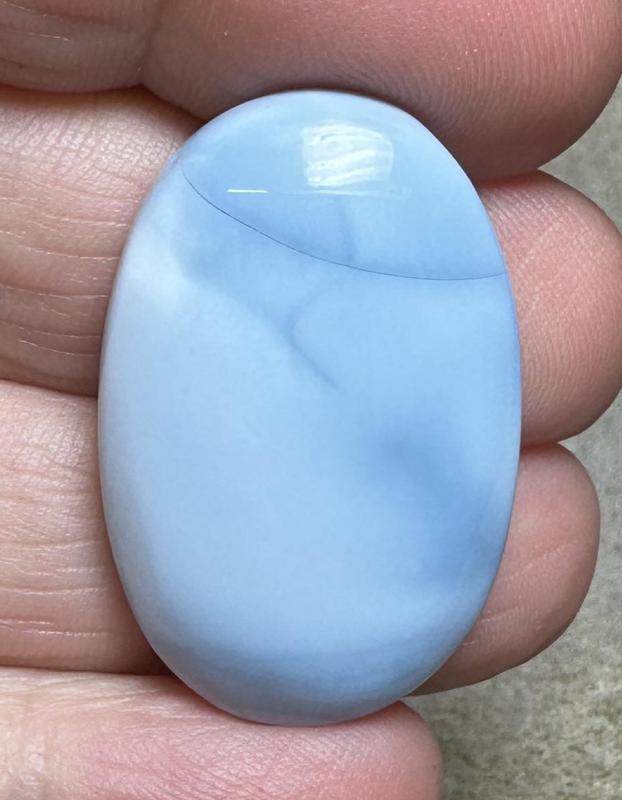 Oval 33x21mm Owyhee Blue Opal Cabochon 38