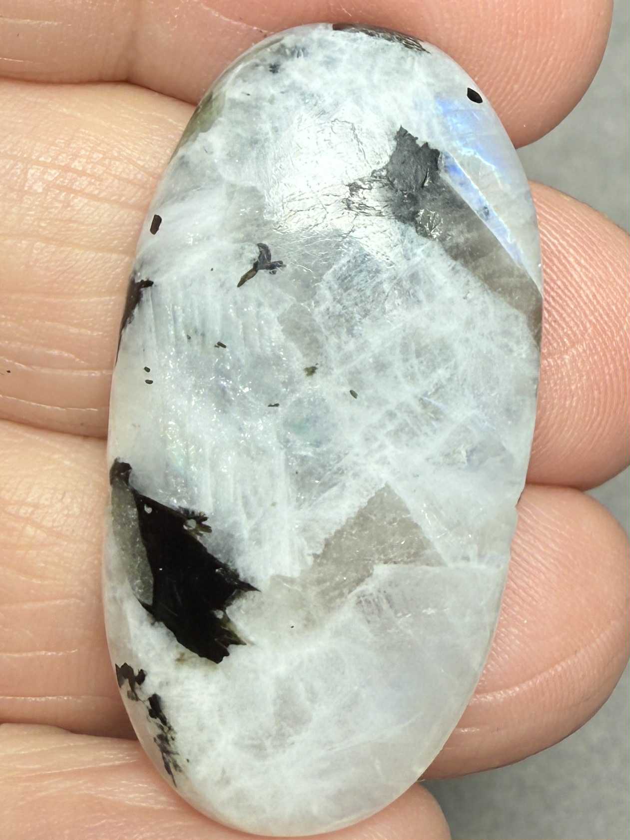 Oval 37x19mm Rainbow Moonstone with Tourmaline Cabochon 24