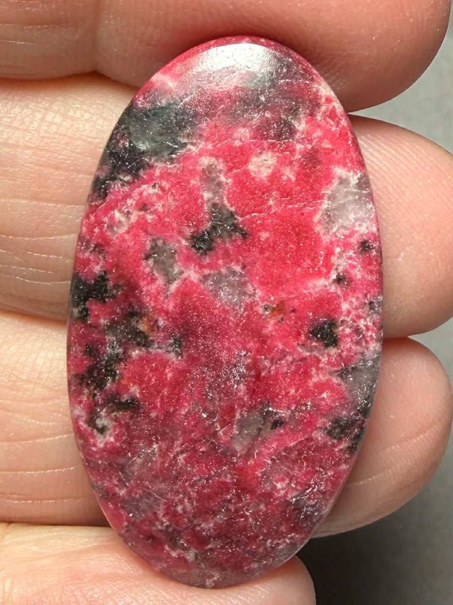Oval 37x21mm Thulite Cabochon 47