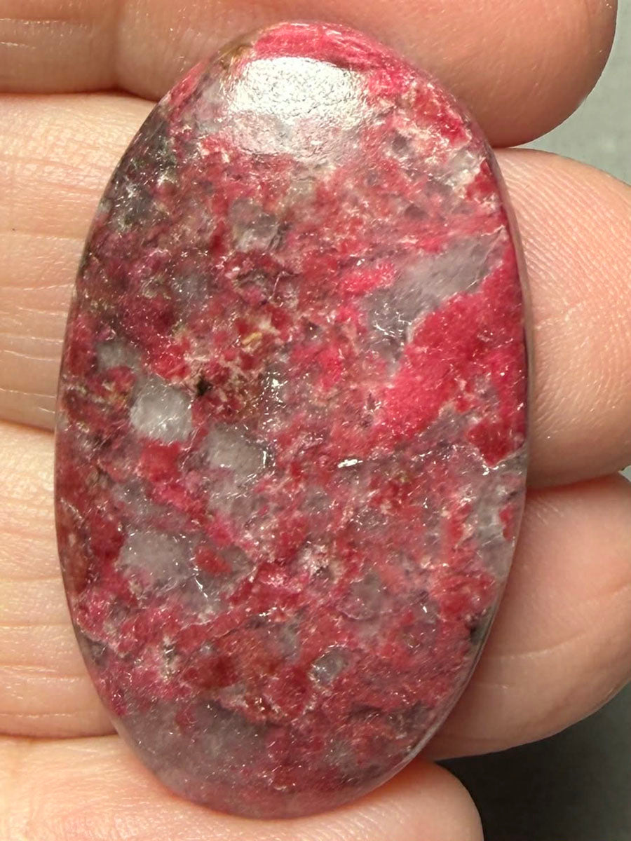 Oval 37x22mm Thulite Cabochon 50