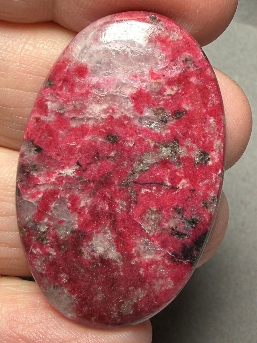 Oval 42x27mm Thulite Cabochon 57