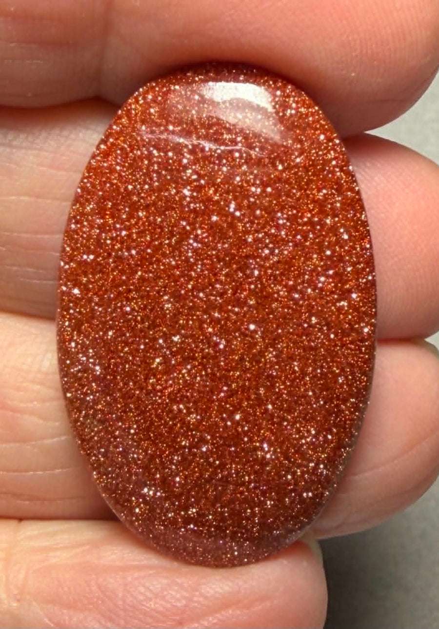 Oval 34x22mm Goldstone Cabochon 08