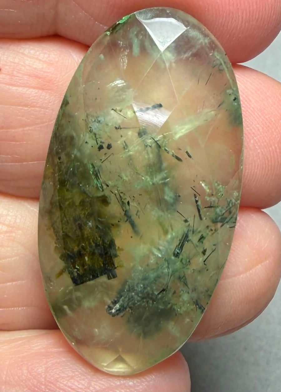 Oval 35x19mm Faceted Prehnite Cabochon 06