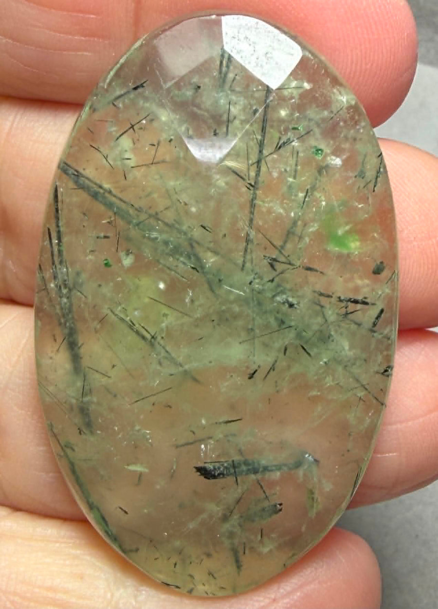 Oval 47x29mm Faceted Prehnite Cabochon 09