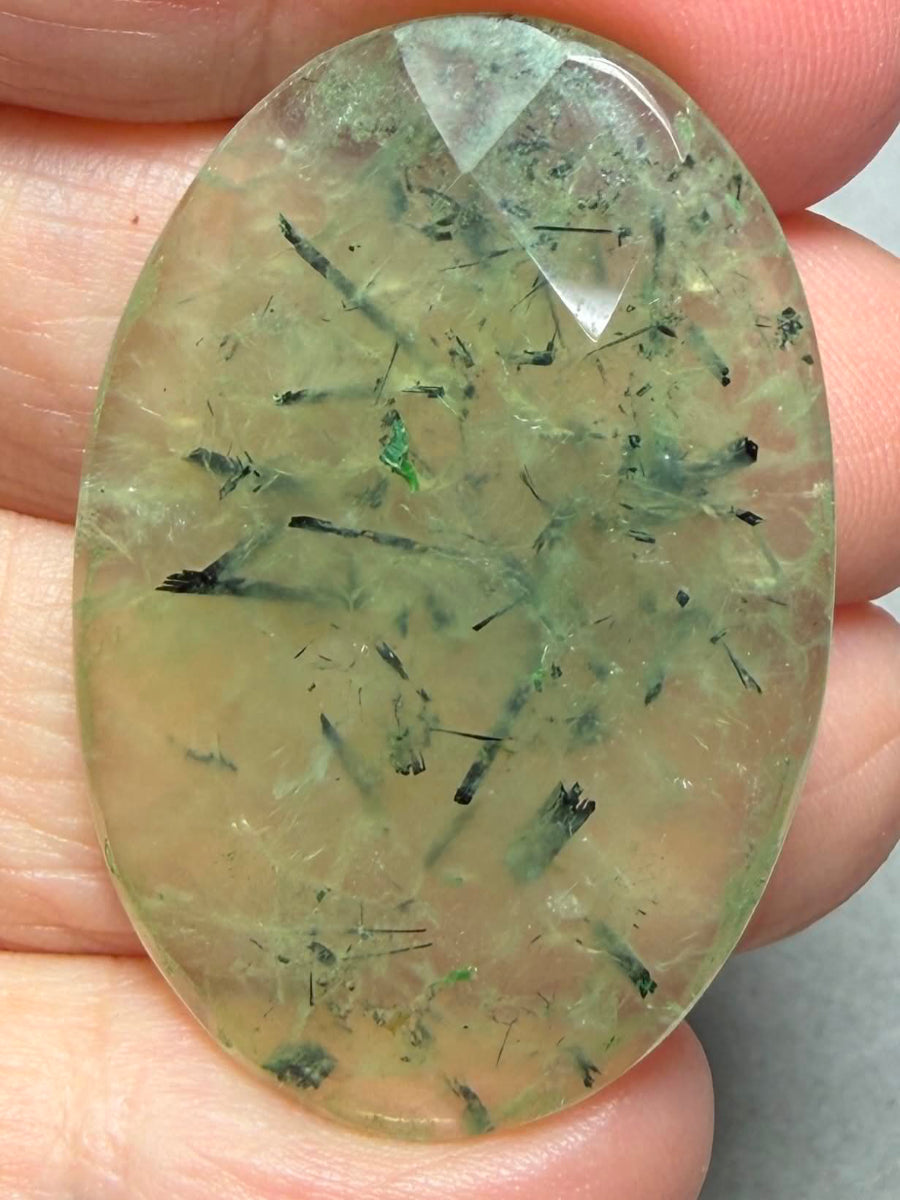 Oval 39x26mm Faceted Prehnite Cabochon 24