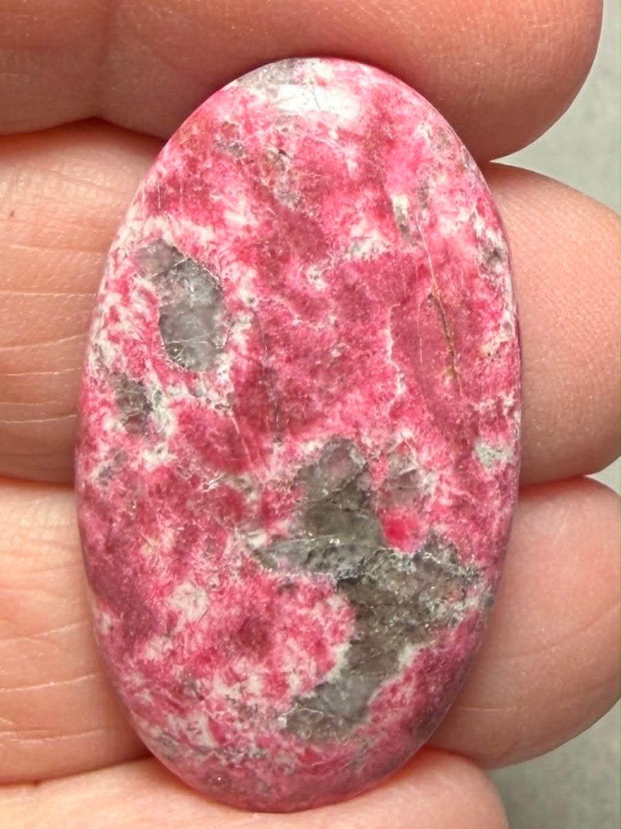 Oval 34x20mm Thulite Cabochon 70