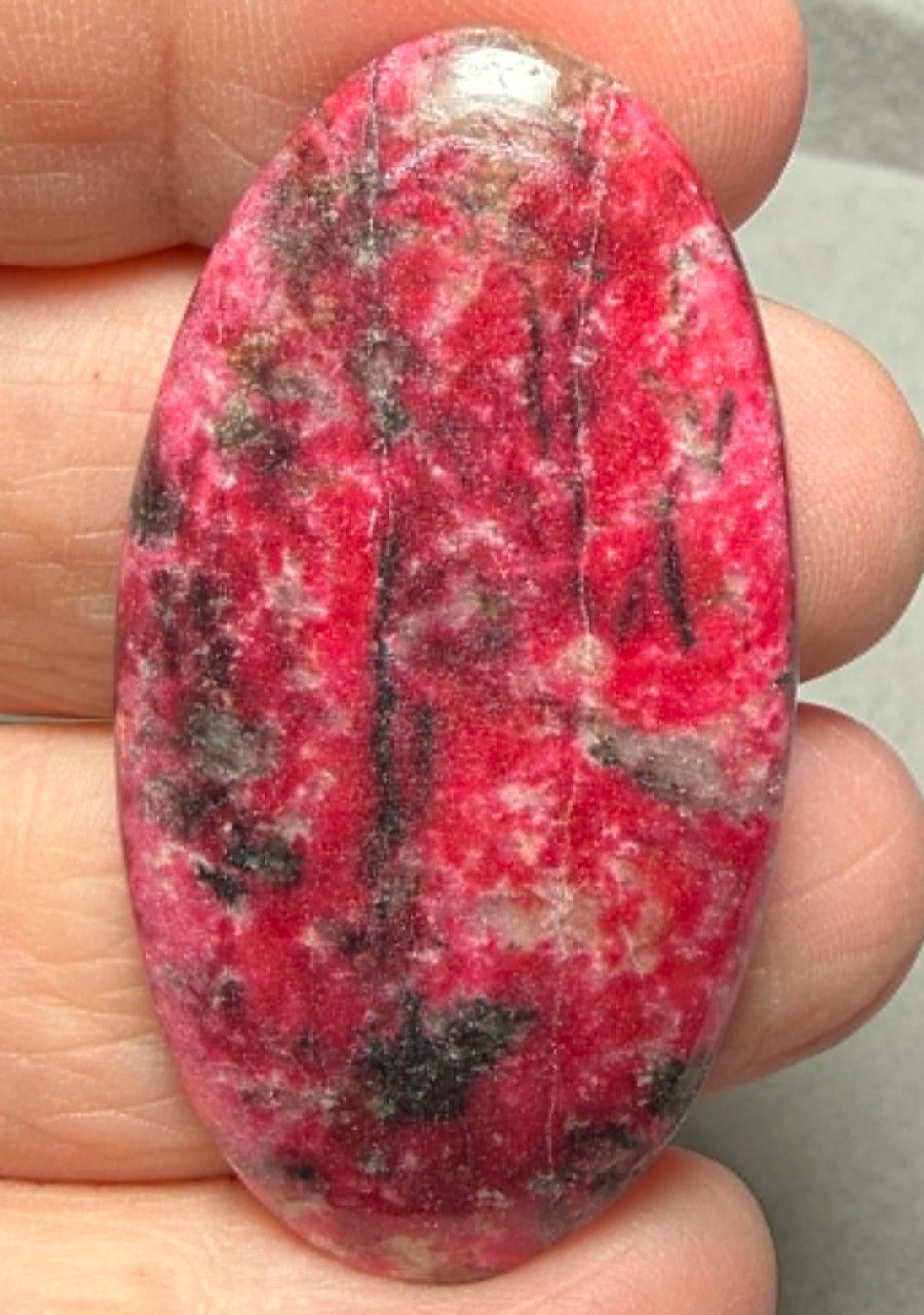 Oval 48x25mm Thulite Cabochon 73
