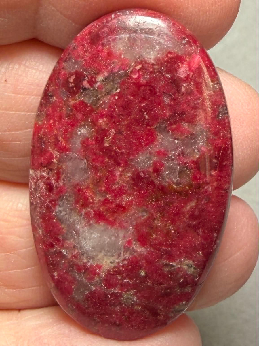 Oval 38x23mm Thulite Cabochon 79