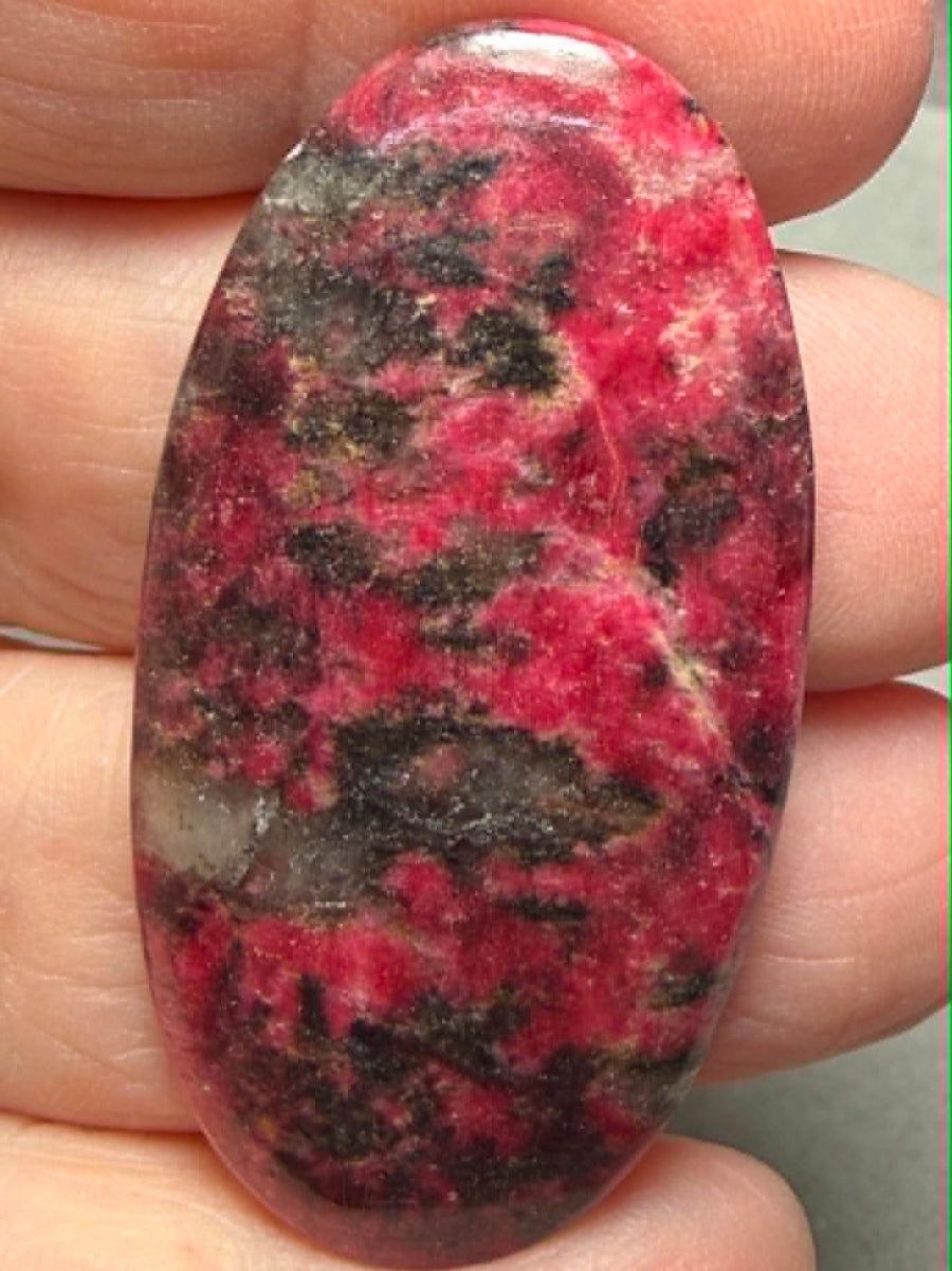 Oval 48x24mm Thulite Cabochon 82