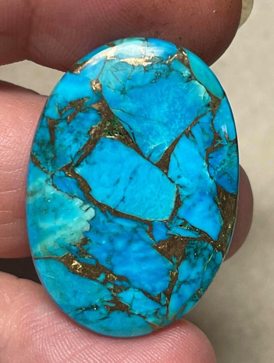 Oval 33x23mm Kingman Turquoise in Bronze Cabochon 32