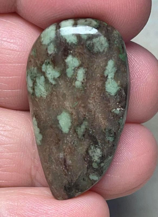 Freeform 34x19mm Nundoorite Cabochon 07