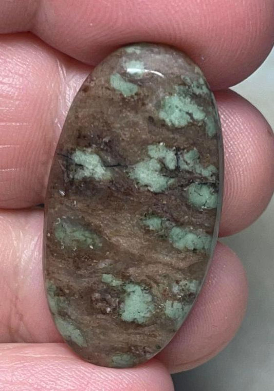 Oval 33x17mm Nundoorite Cabochon 23