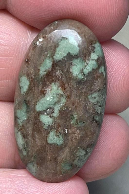 Oval 33x18mm Nundoorite Cabochon 36