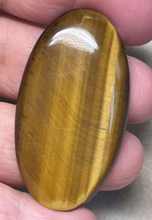Oval 51x27mm Tigers Eye Cabochon 09