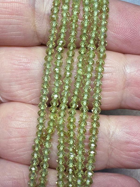 12 inch 2mm Round Faceted Peridot Bead String