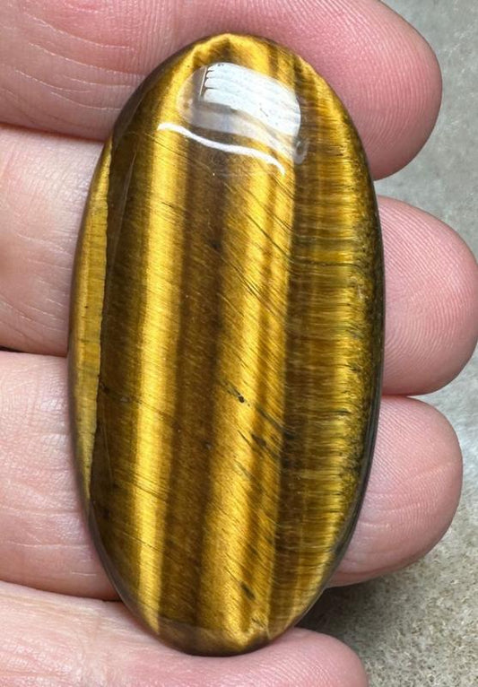 Oval 49x25mm Tigers Eye Cabochon 33