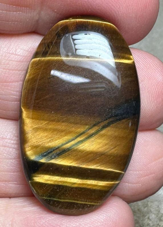 Oval 35x21mm Tigers Eye Cabochon 44