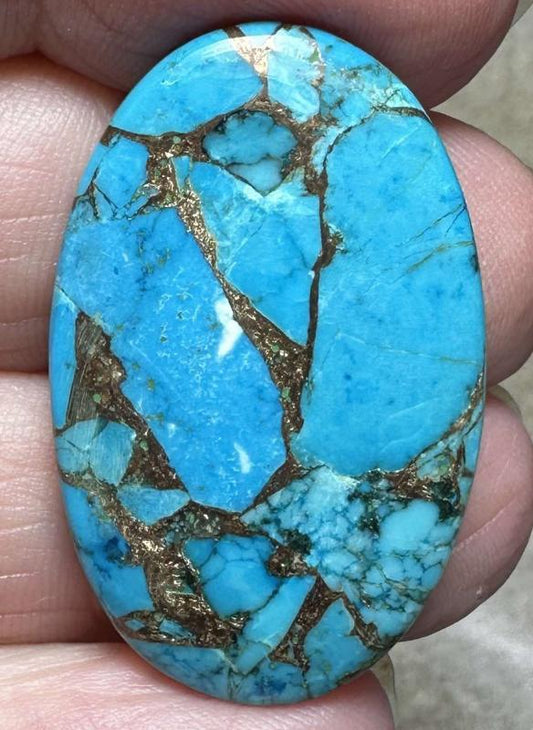 Oval 34x21mm Kingman Turquoise in Bronze Cabochon 28
