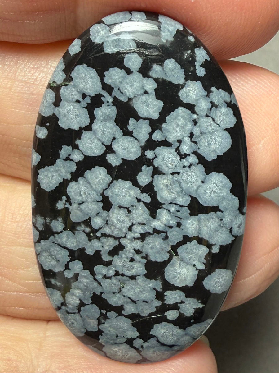 Oval 43x24mm Snowflake Obsidian Cabochon 36