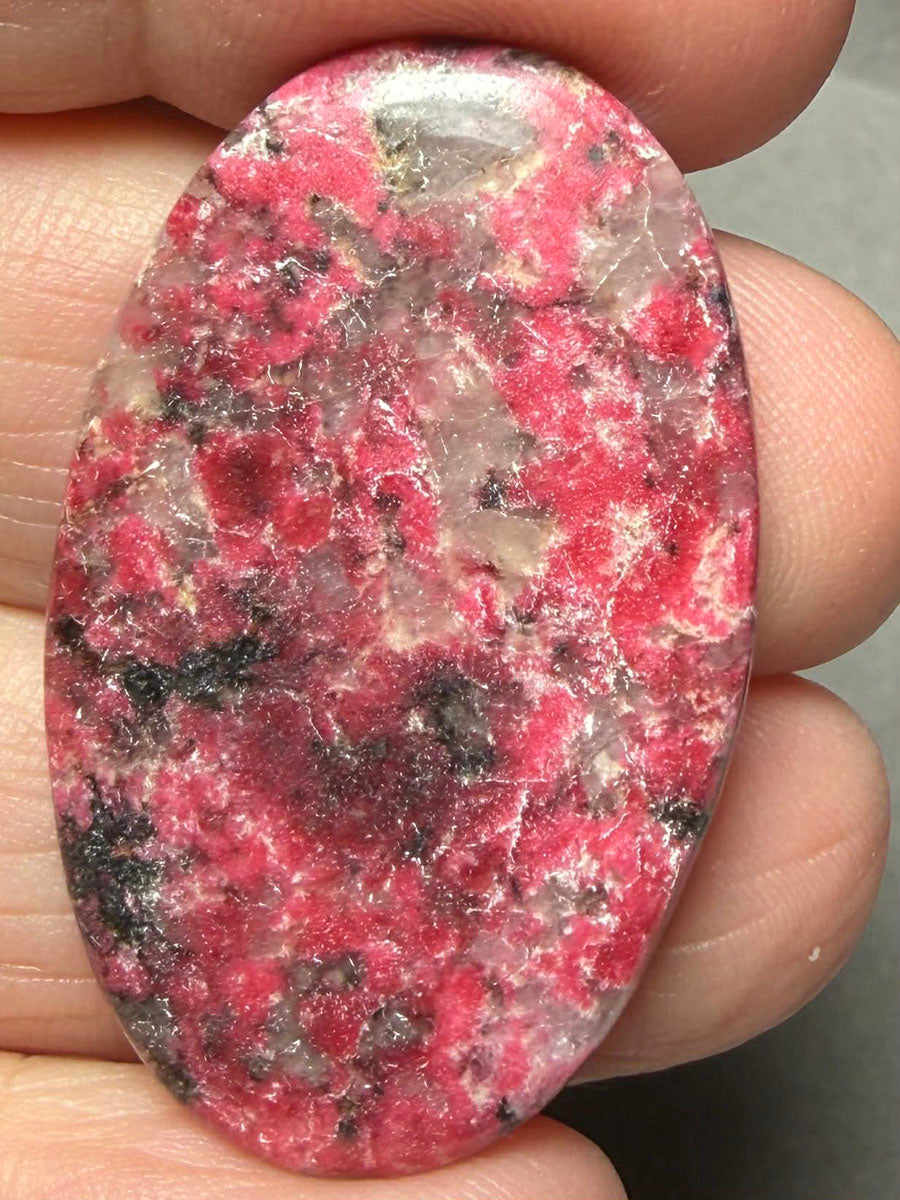 Oval 39x24mm Thulite Cabochon 53