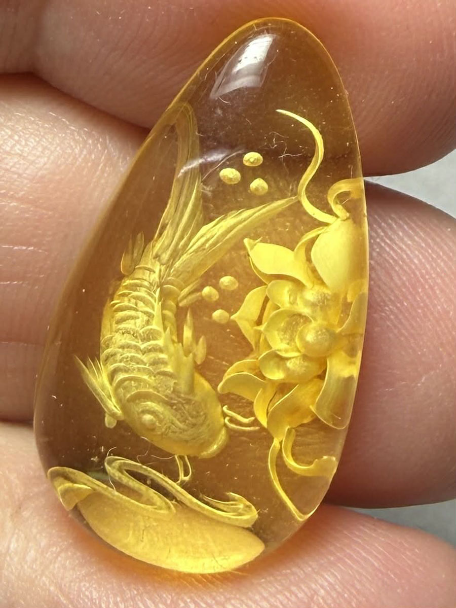 Teardrop 27x15mm Carved Koi Amber Cabochon 54