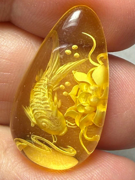 Teardrop 27x15mm Carved Koi Amber Cabochon 54