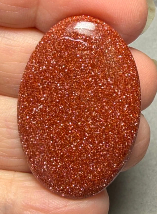 Oval 39x26mm Goldstone Cabochon 10