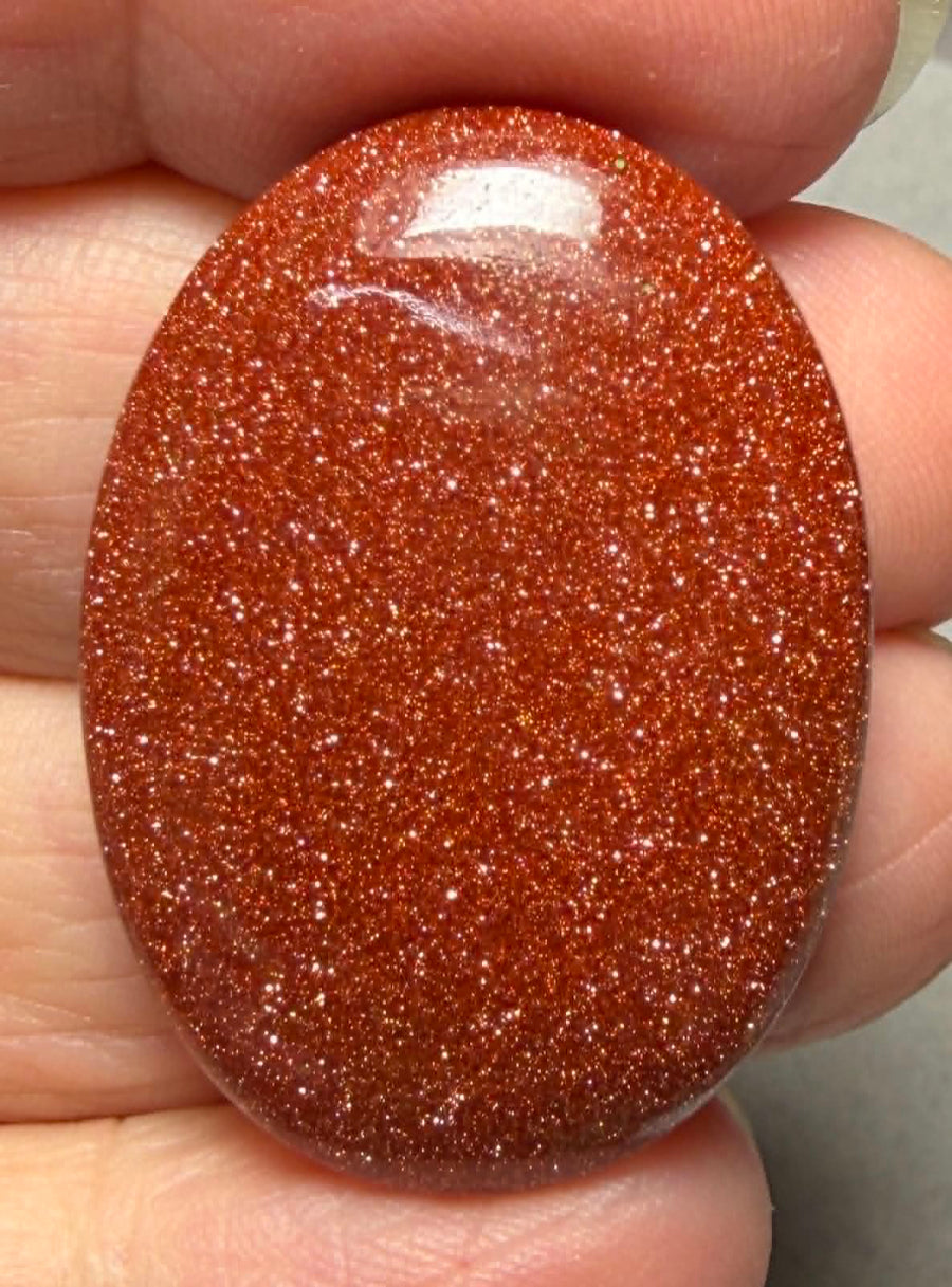 Oval 35x25mm Goldstone Cabochon 11