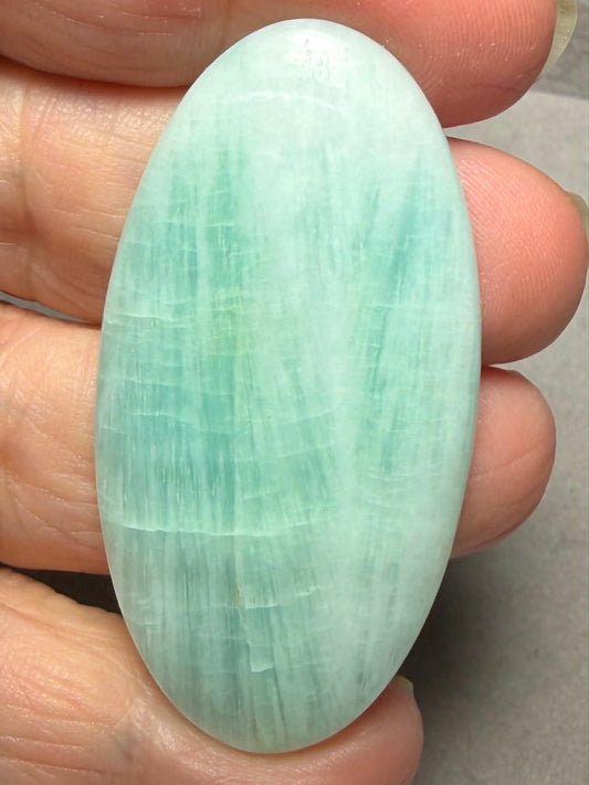 Oval 53x27mm Caribbean Blue Calcite Cabochon 58