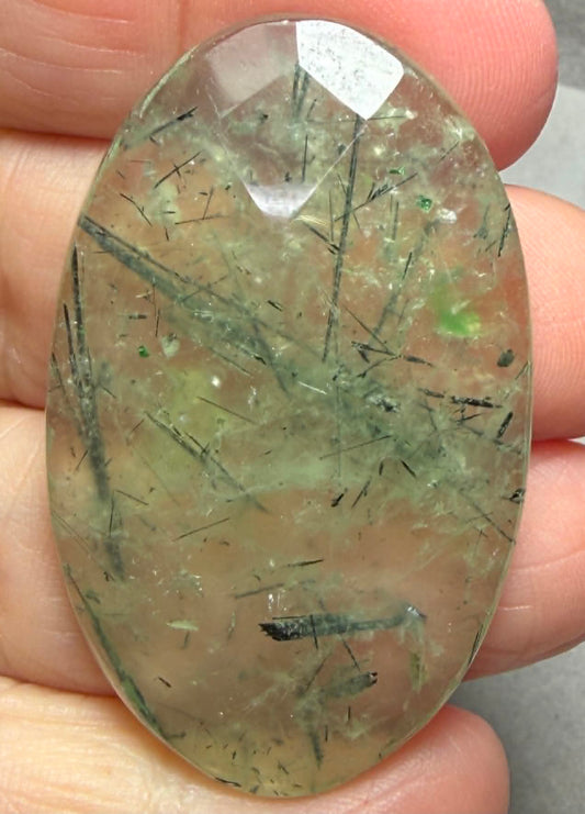Oval 47x29mm Faceted Prehnite Cabochon 09