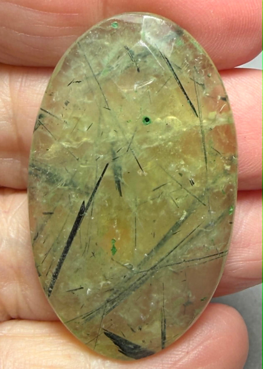 Oval 46x27mm Faceted Prehnite Cabochon 19