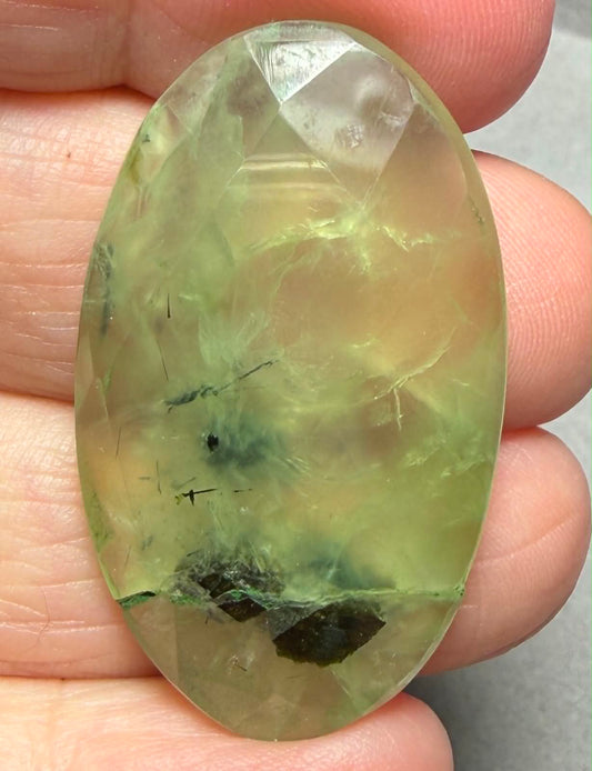 Oval 39x23mm Faceted Prehnite Cabochon 21
