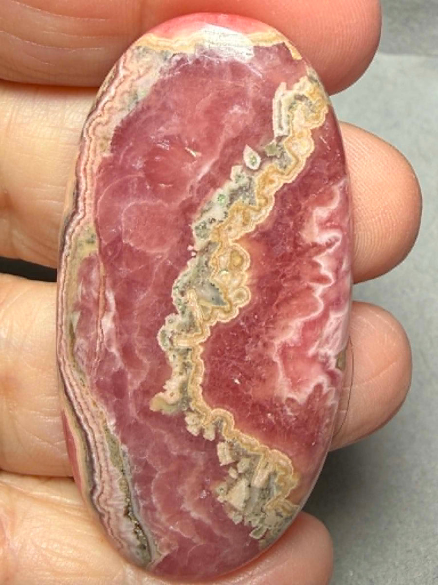 Oval 55x28mm Rhodochrosite Cabochon 84