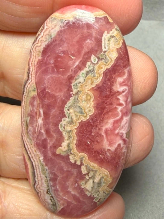 Oval 55x28mm Rhodochrosite Cabochon 84