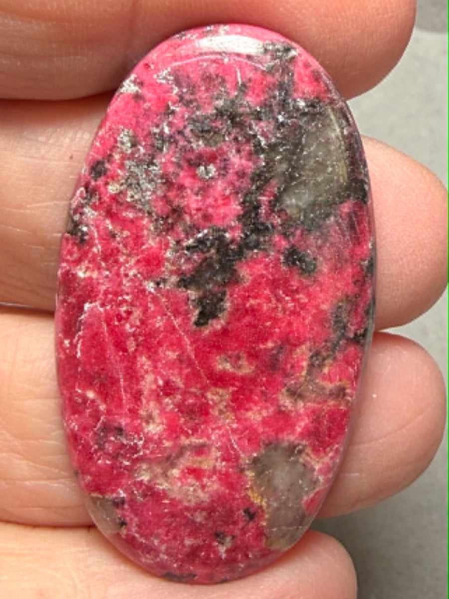 Oval 44x24mm Thulite Cabochon 66
